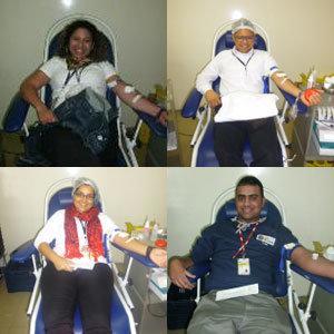 Nair Iembo, Billing, Credit and Collection Supervisor Brazil ;William Costa Marques, Menu Design Sub Chef Brazil; Liziane Neumann, local Account Manager donating blood and Dirceu Almeida dos Santos, local Bonded Operations employee
